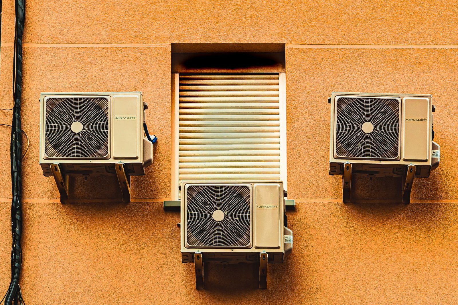 Outdoor air conditioning condenser units mounted on a building exterior